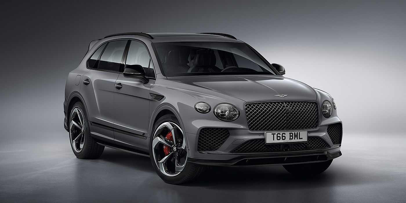 Bentley Zug Bentley Bentayga S in Cambrian Grey paint front three - quarter view with dark chrome matrix grille and featuring elliptical LED matrix headlights. 