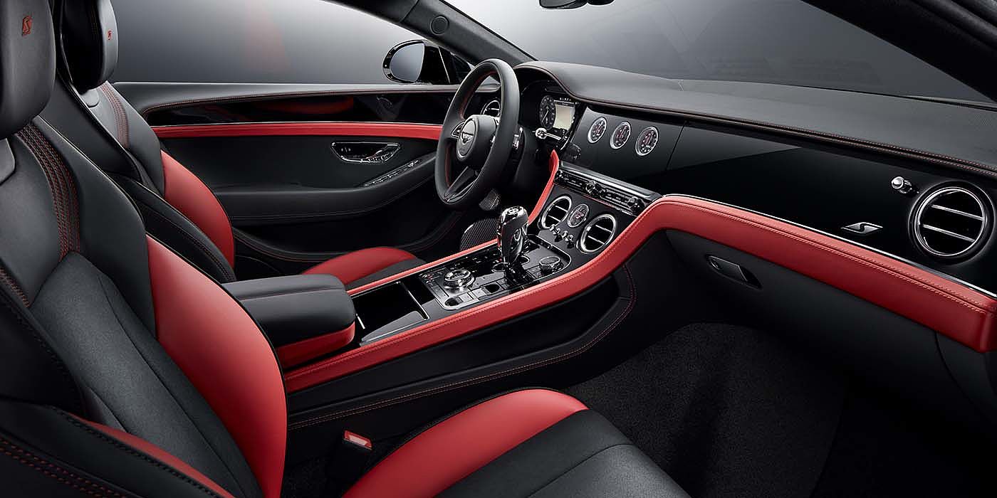Bentley Zug Bentley Continental GT S coupe front interior in Beluga black and Hotspur red hide with high gloss Carbon Fibre veneer