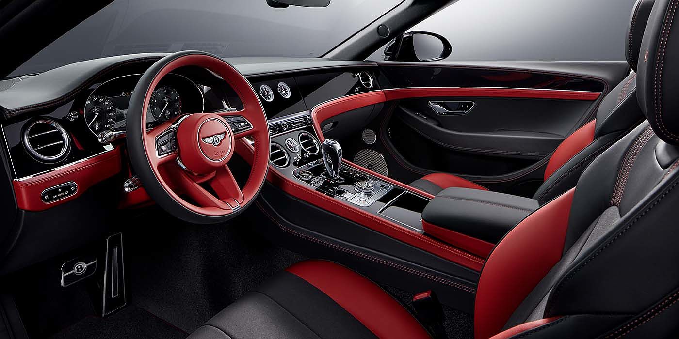 Bentley Zug Bentley Continental GTC S convertible front interior in Beluga black and Hotspur red hide with high gloss carbon fibre veneer