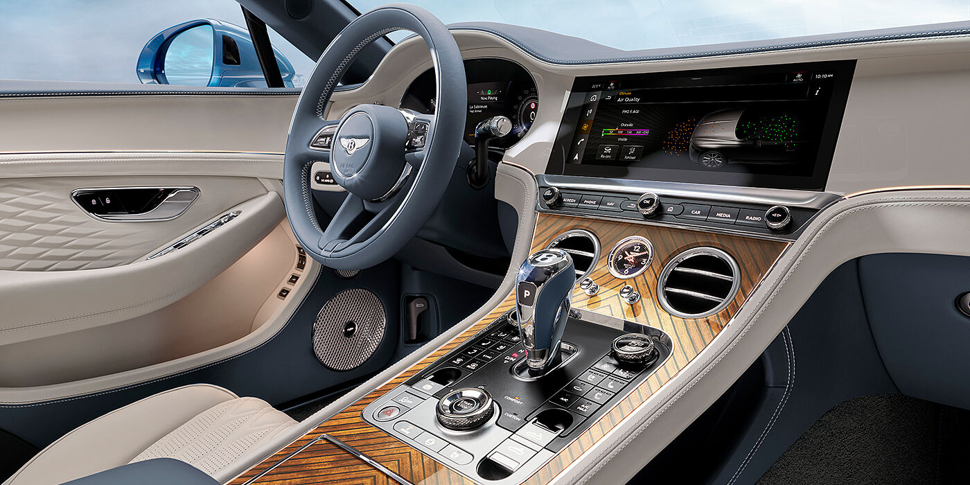 Bentley Zug New Bentley Continental GTC Azure convertible interior front cabin view with Linen and Brunel hides and Piano Linen by Mulliner veneer featuring centre console and centre MMI screen