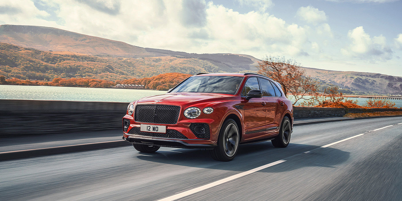 Bentley Zug Bentley Bentayga S SUV in Candy Red paint front 34 dynamic