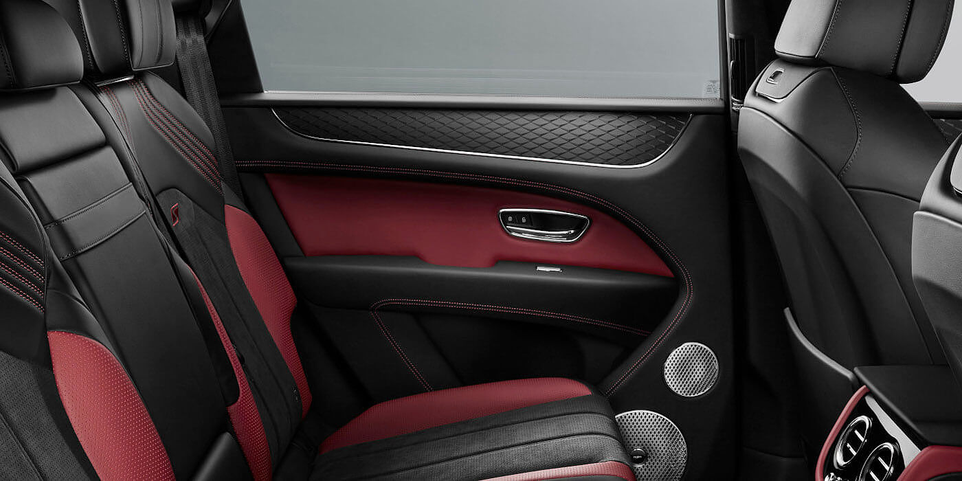 Bentley Zug Bentley Bentayga S SUV rear interior in Beluga black and Hotspur red hide
