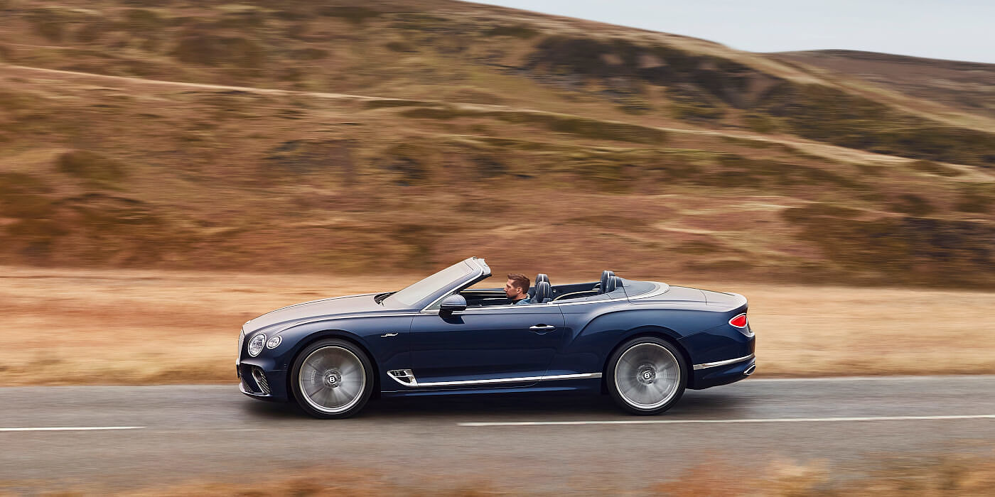 <new-bentley-continental-gt-speed-convertible-in-peacock-blue-profile-in-peak-district> 