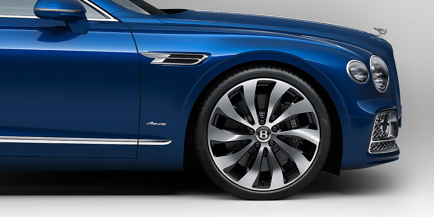Bentley Zug Bentley Flying Spur Azure sedan side close up in Sequin Blue paint with Azure badge
