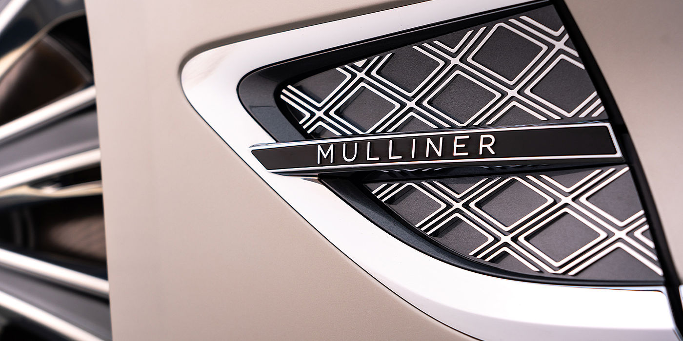 Bentley Zug Bentley Continental GT Mulliner coupe in White Sand paint Mulliner wing vent close up