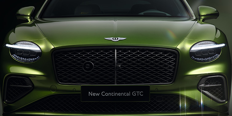 Bentley Zug Bentley Continental GTC Speed convertible front bonnet detail in Tourmaline Green paint showing new light design