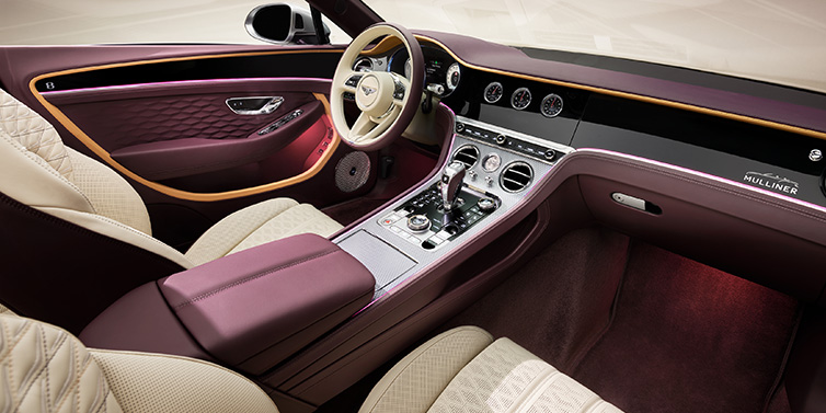 Bentley Zug Bentley Continental GTC Mulliner convertible front interior including Linen and Damson purple hides and Grand Black veneer