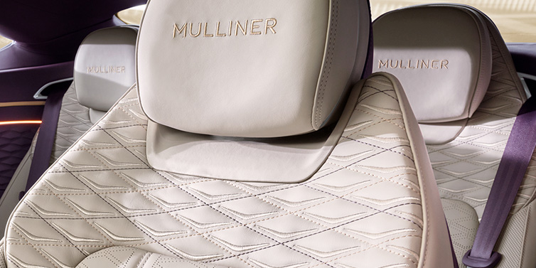 Bentley Zug Bentley Continental GT Mulliner coupe seat detail in Linen leather with Mulliner Diamond in Diamond quilting and Mulliner embroidered seat emblem